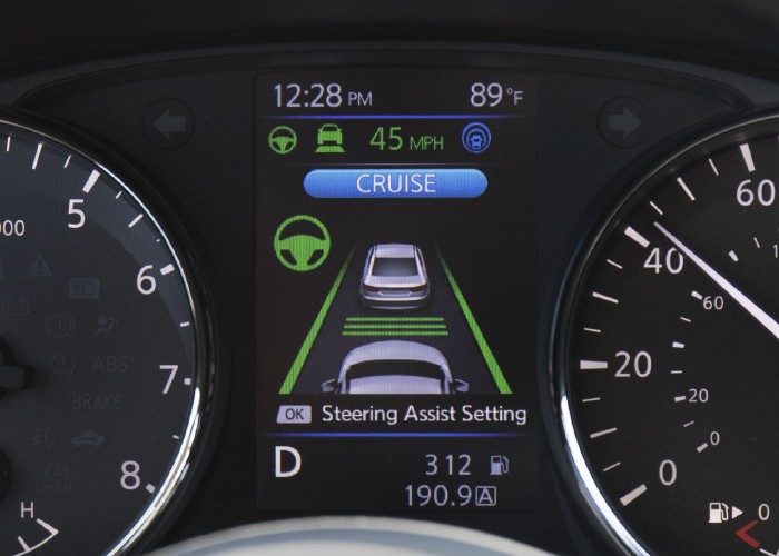 OEM diagnostic tool connected to a vehicle